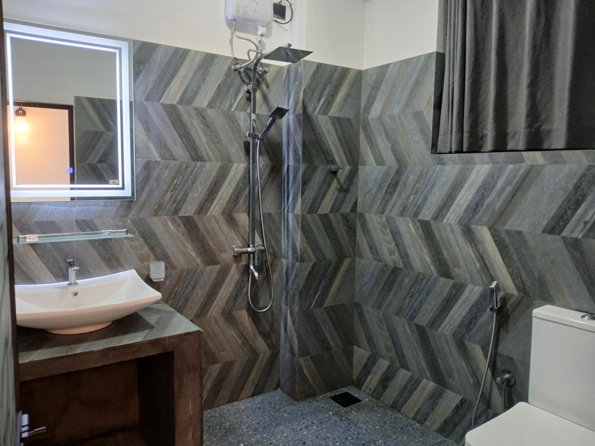 Turtle Beach House Batigama Quarto foto